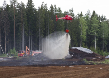 Årsunda: Brand på torvtäckt