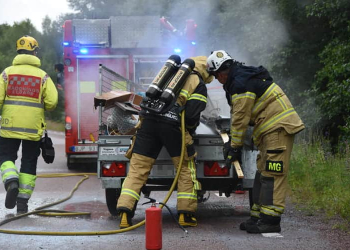 Norrala: Brand i släpvagn